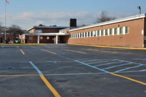 school with parking lot
